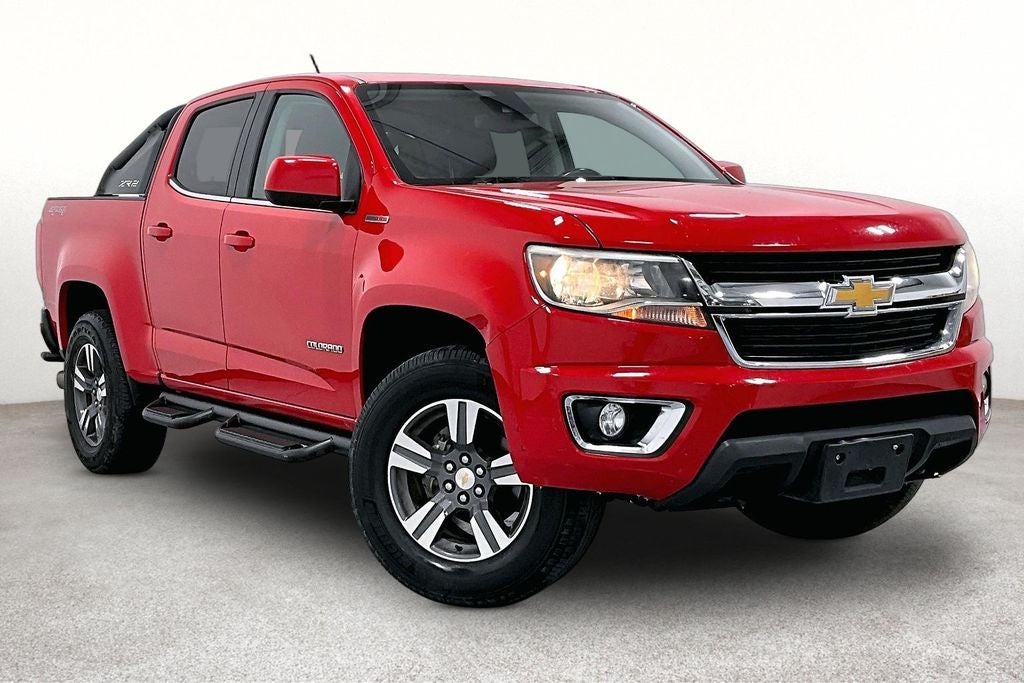 2018 Chevrolet Colorado LT in Red Hot — front three-quarter view