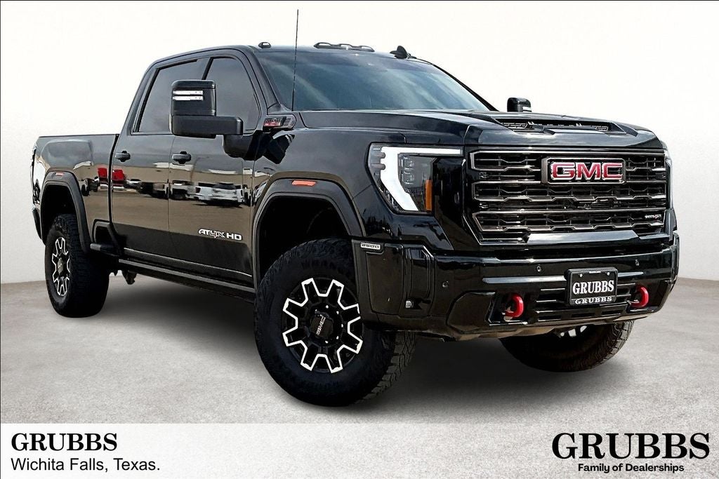 2025 GMC Sierra 2500HD AT4X in Onyx Black — front three-quarter view