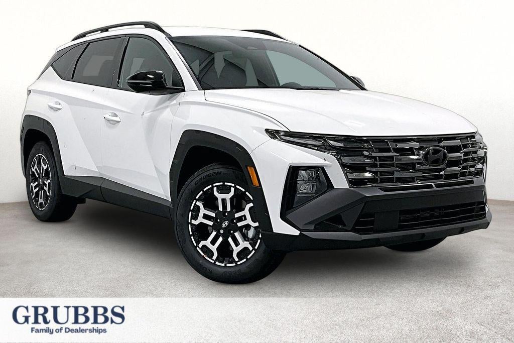 2026 Hyundai TUCSON XRT AWD in White Pearl — front three-quarter view