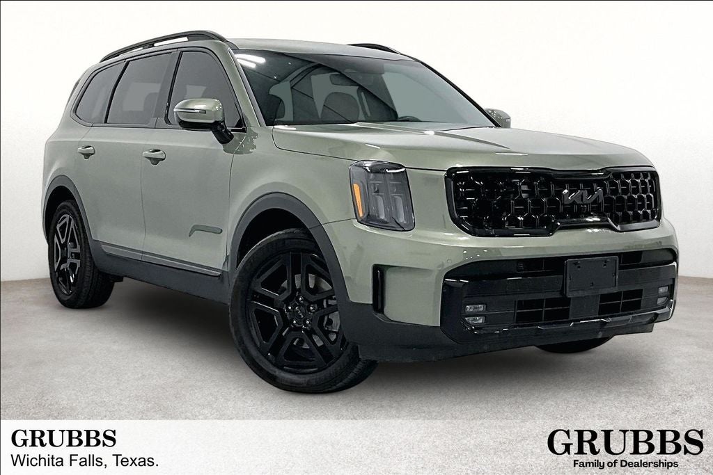 2025 Kia Telluride SX X-Line in Jungle Green — front three-quarter view