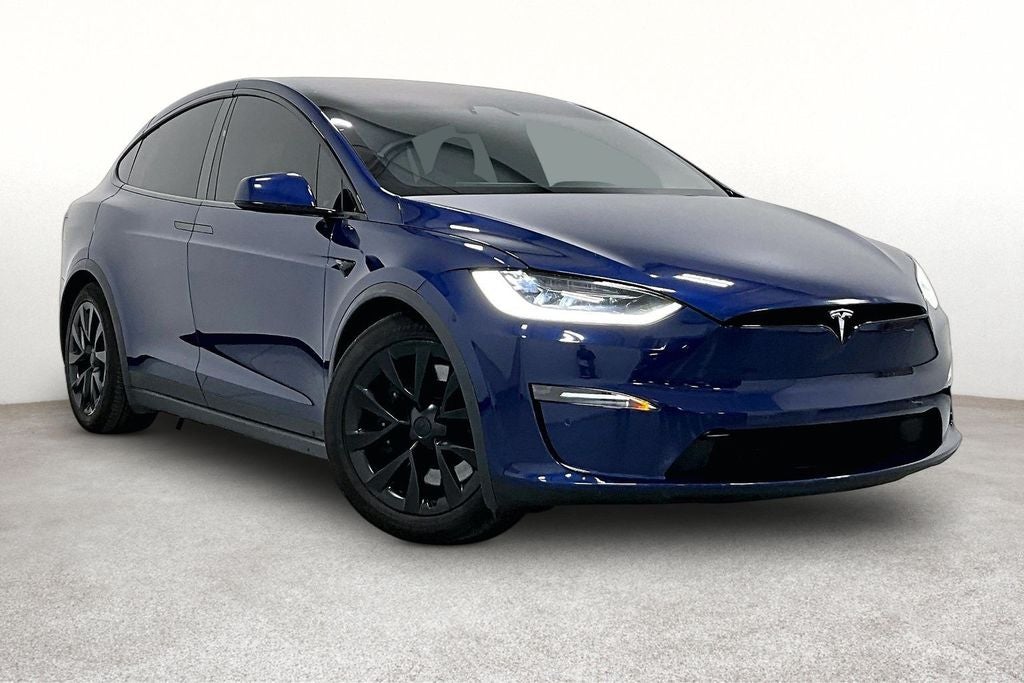 2022 Tesla Model X Base in Deep Blue Metallic — front three-quarter view
