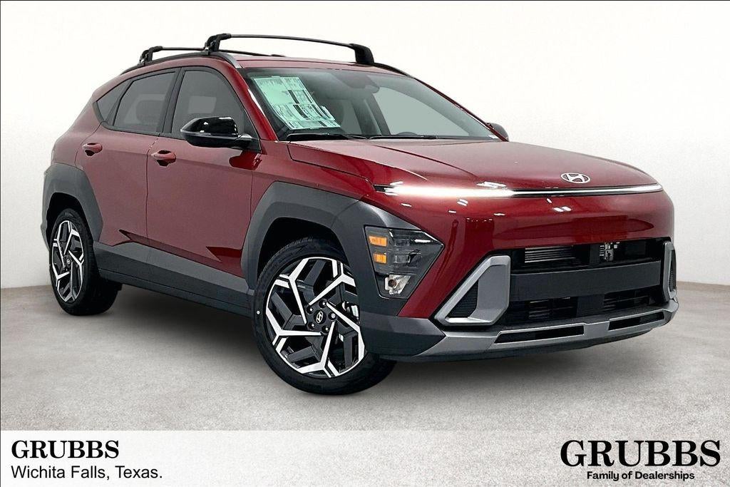 2026 Hyundai KONA SEL Premium FWD in Ultimate Red Metallic — front three-quarter view